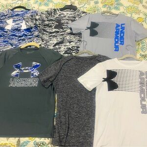 6 youth size Large Under Armour dri-fit shirts